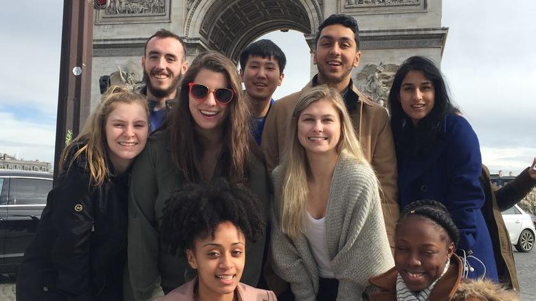 Students in front of the Arc De Triomphe in Paris